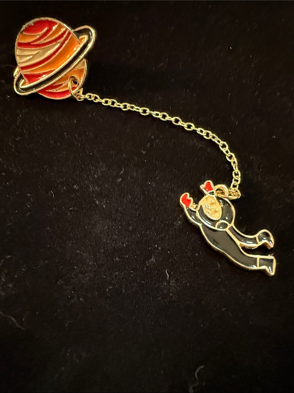 New 4” Pin Saturn with Astronaut on chain enameled